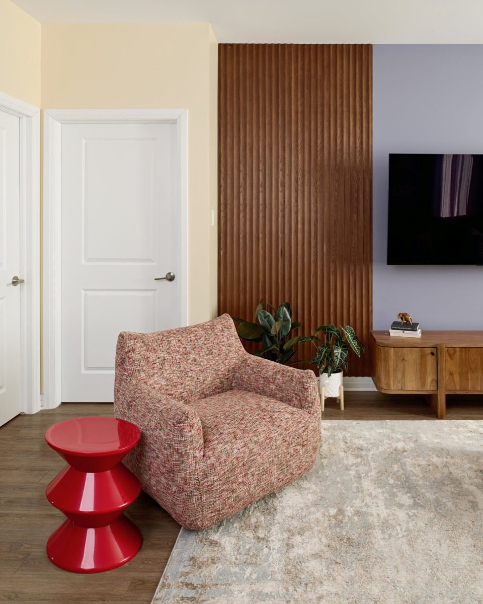 Contemporary living room with layered textures and colourful throw pillows